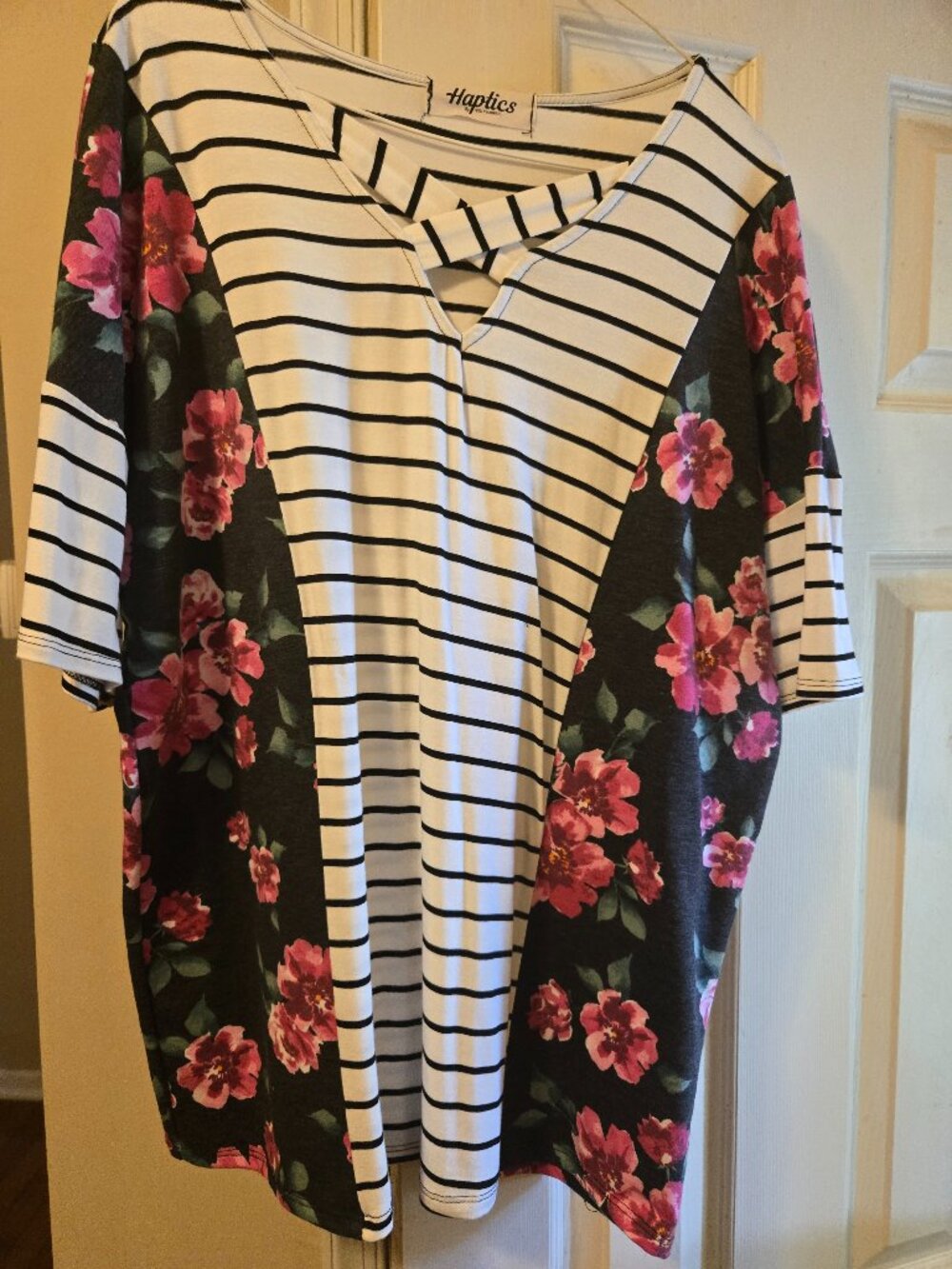 Haptics L top black stripe with floral accents down each side panel